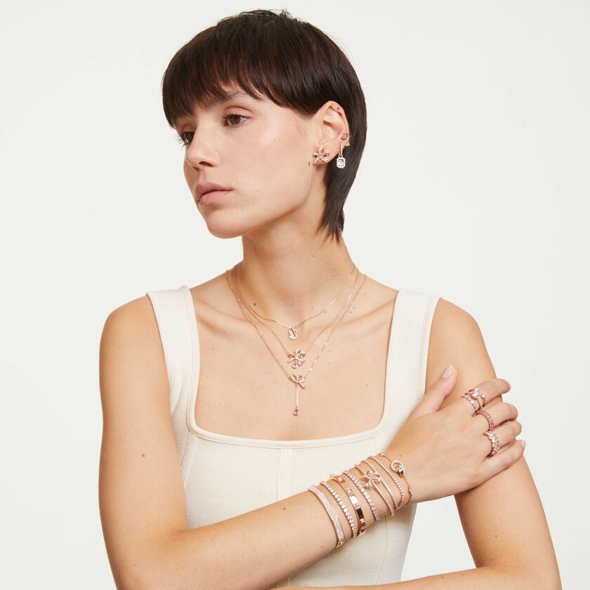 swarovski سوار dextera، لون أبيض، لمسة نهائية بلون ذهبي وردي