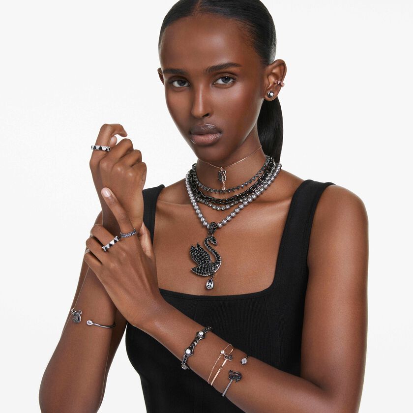 سوار swarovski swan، على شكل بجعة، لون أسود، طلاء ذهبي وردي