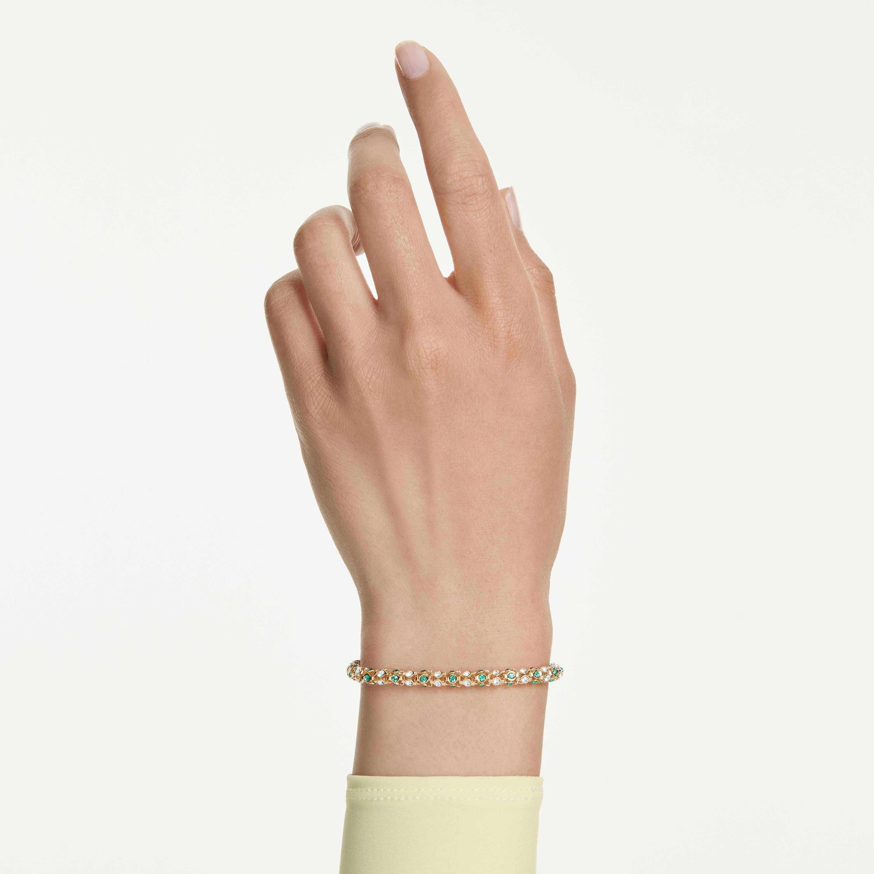 swarovski dextera bracelet  round cut  green  gold tone finish