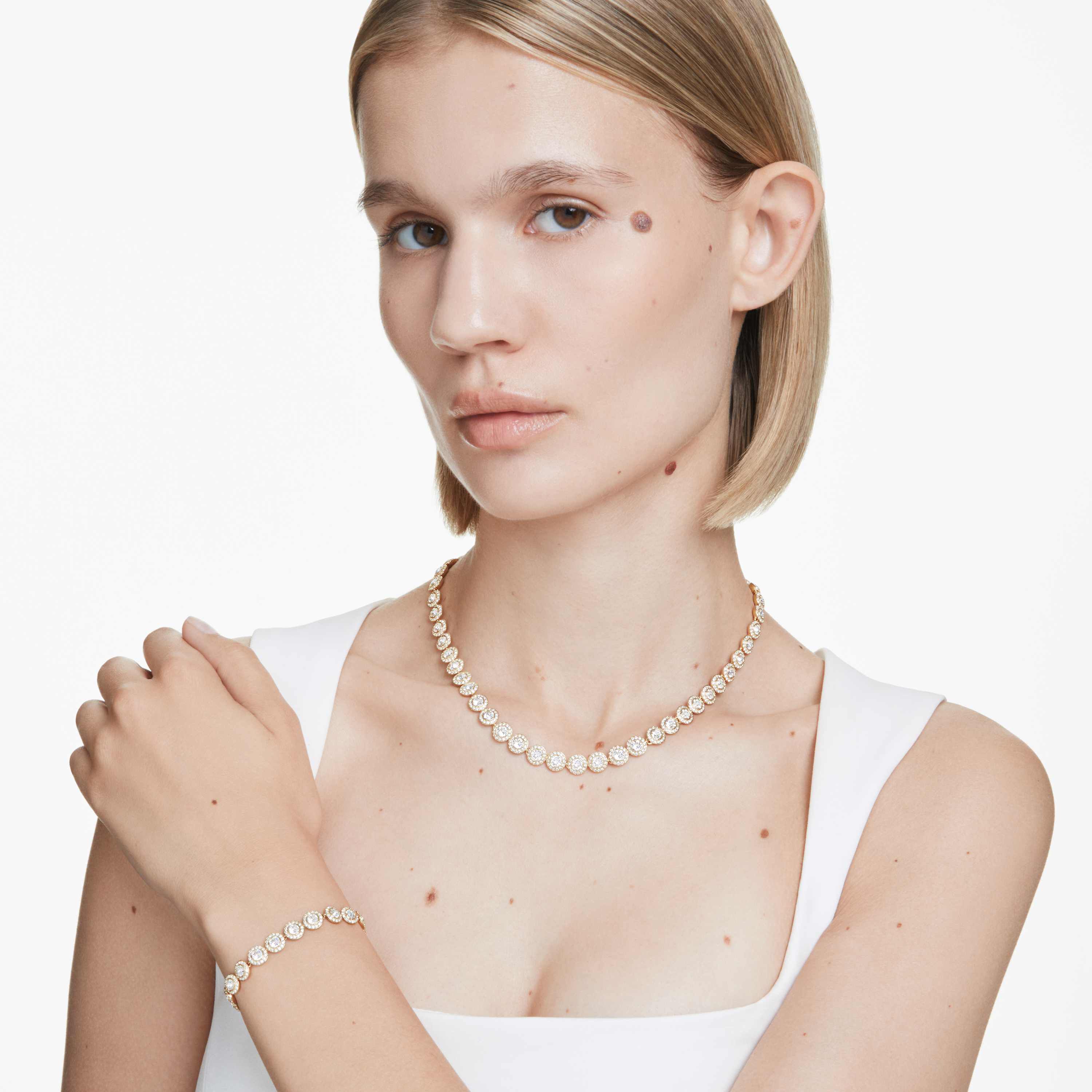 swarovski طقم una angelic، قطع مُستدير، لون أبيض، طلاء باللون الذهبي